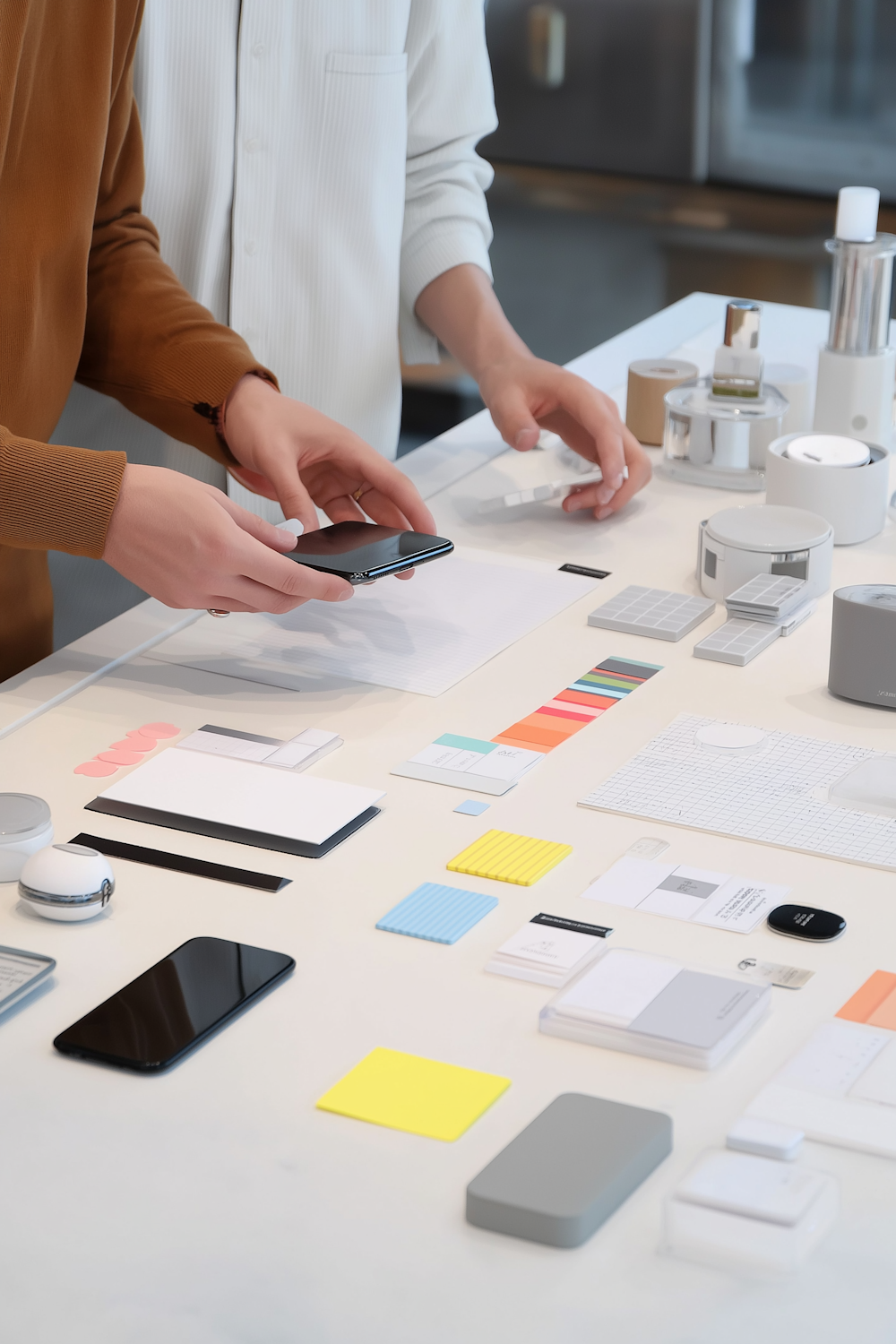 Designers working through ideas at a workshop table